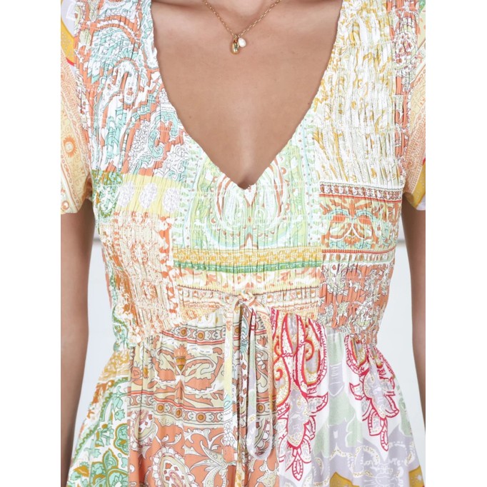 Boho chic dress with short sleeves and fringe lace-up